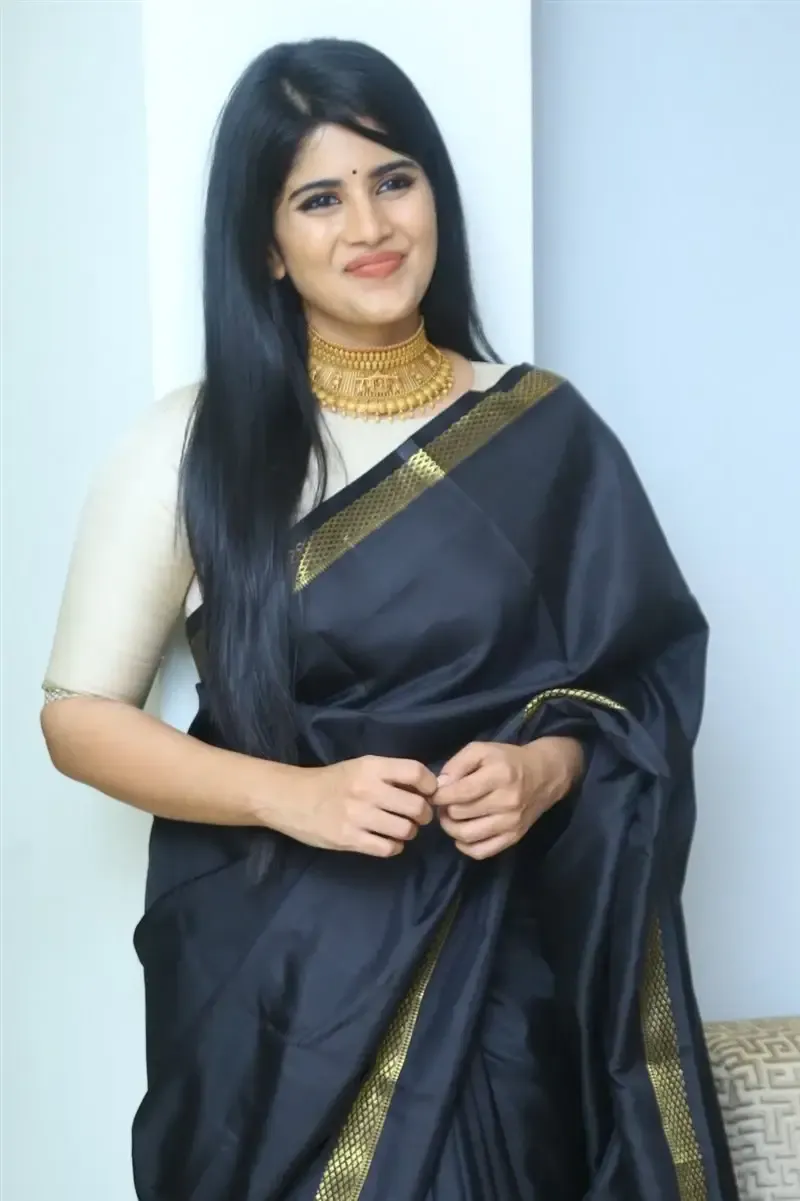 Megha Akash in Black Saree at Manu Charitra Telugu Movie Trailer Launch